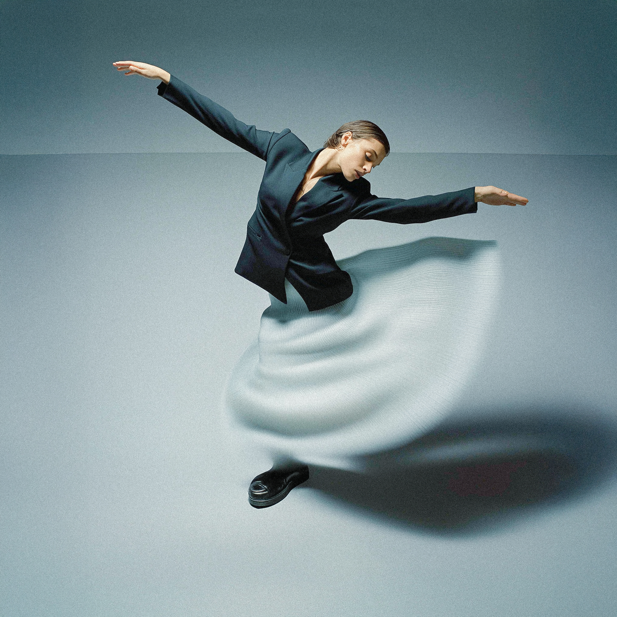 jay770282_A_cinematic_high_angle_fashion_photograph_of_a_woman__9694b760-a45a-4661-a755-fb8234b9b3f7